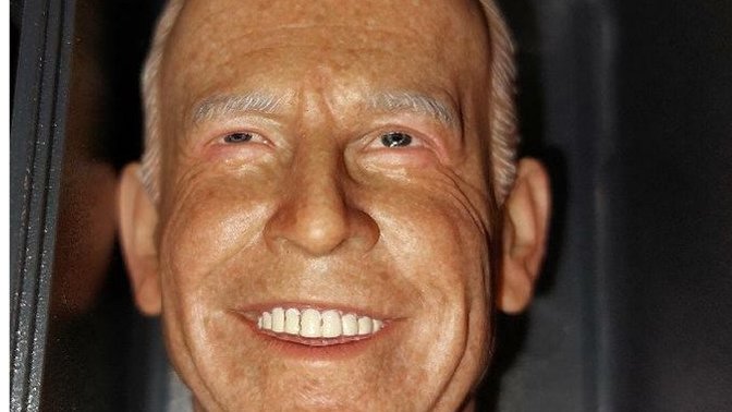 Which of these doll heads looks closer to Biden?