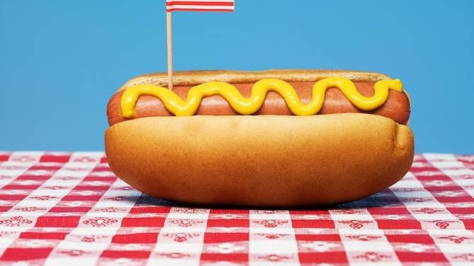 Why are hot dogs called hot dogs when they don’t contain any dog meat?