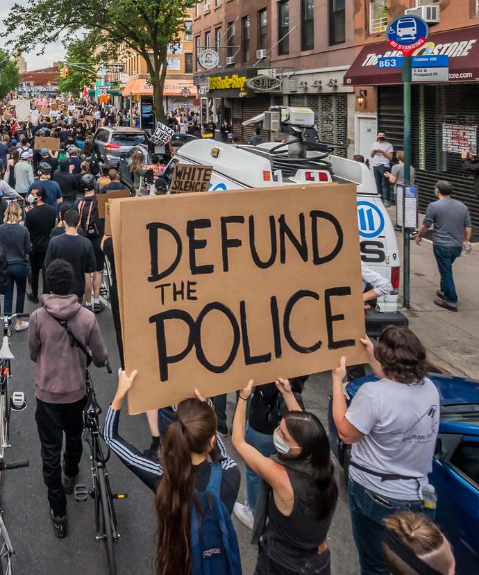 What would you think if you see someone with a T-shirt with clear big words Defund The Police words on it out in public?