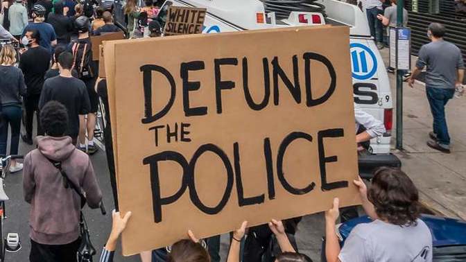 What would you think if you see someone with a T-shirt with clear big words "Defund The Police" words on it out in public?