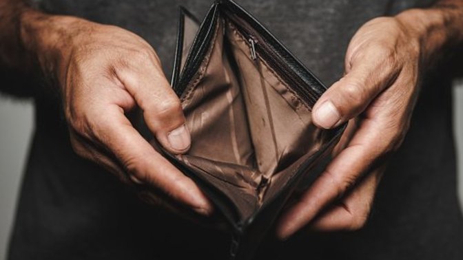 Why would a guy pretend to have less cash than he actually has to his girlfriend?