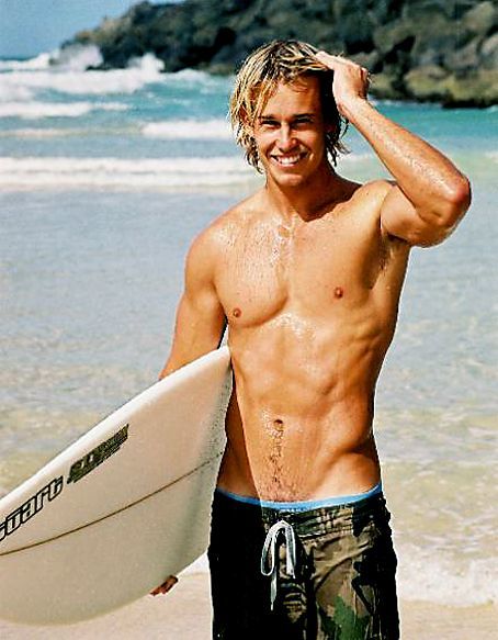 What do girls see physically attractive in boys?