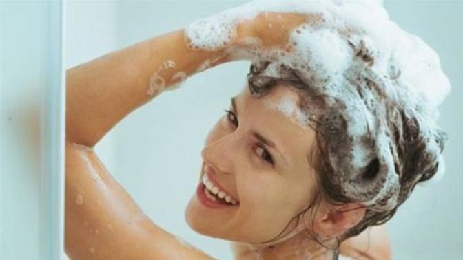 Where do you pour the hair shampoo in the shower?