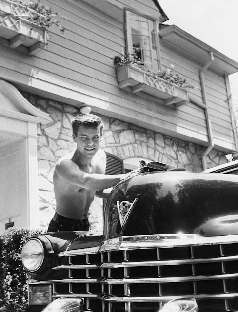 Lets look at some photos of celebrities & their cars taken from the past... Which one is your favorite?