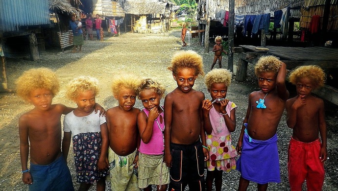 Can black people be born with blonde hair?