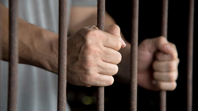Is it a violation of prison rules to snitch on guards?