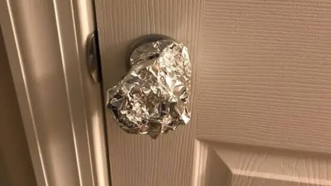 Why foil on doorknob?
