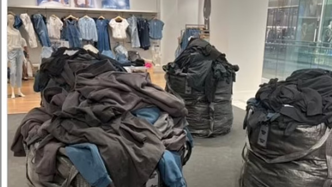 Kayne West's Yeezy Line put in trash bags at GAP. Dumpsters next?