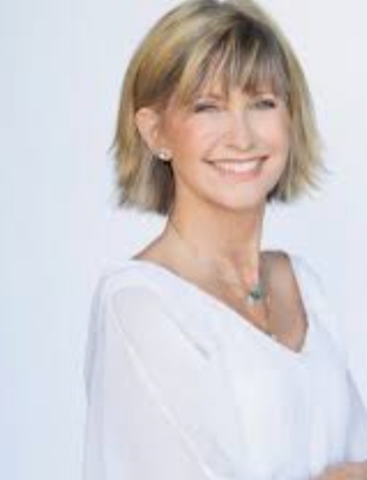 This is a tribute to Olivia newton John your choice of favorite song?