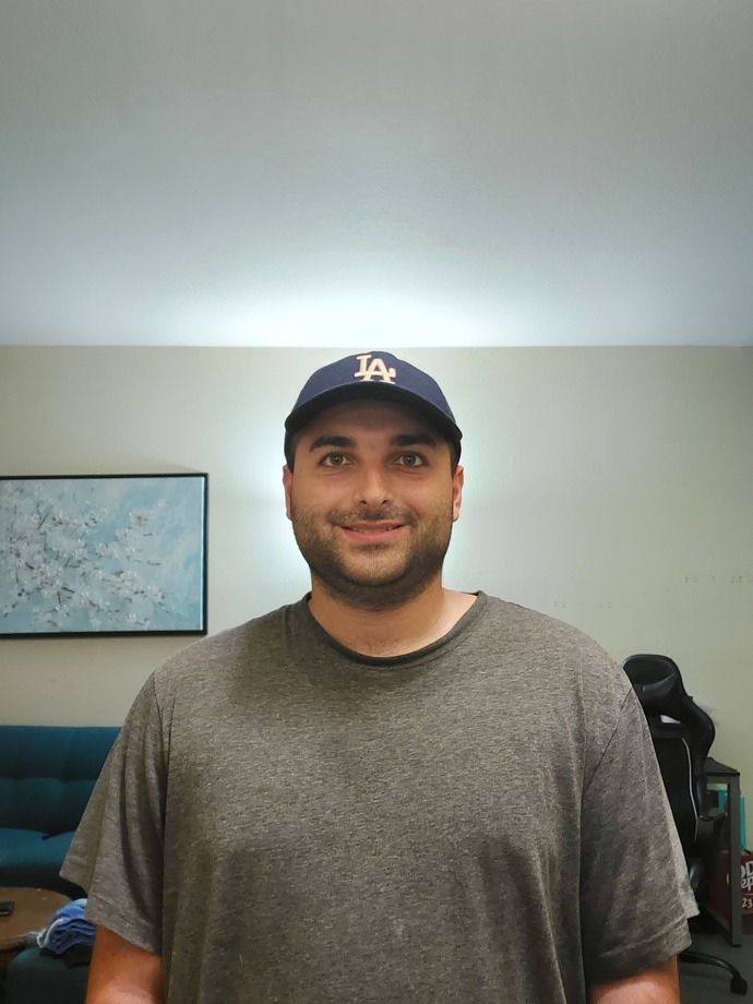 Which of these four photos makes for a better first impression on a dating platform?