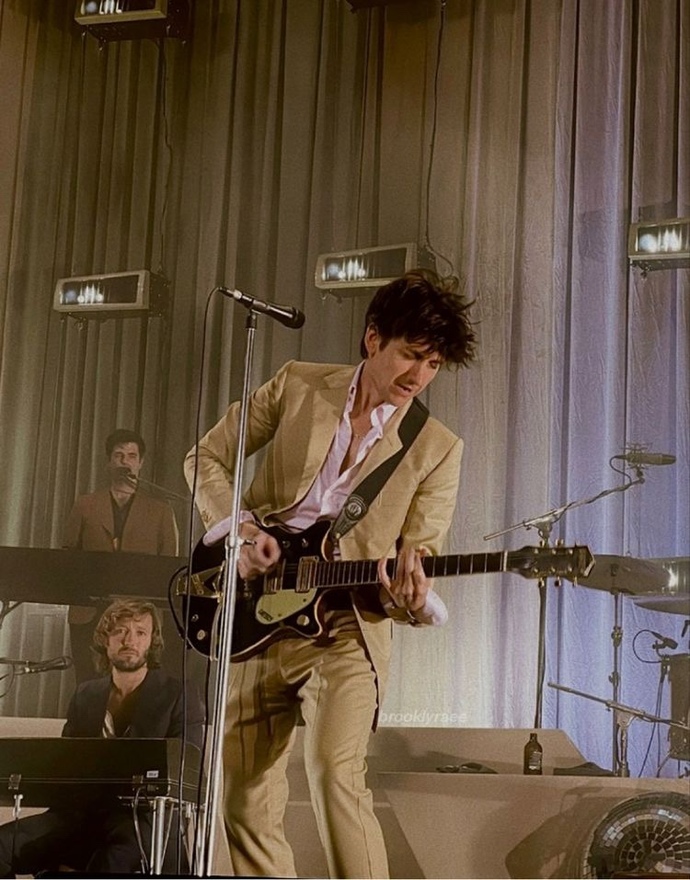Why are men who play any type of guitar so attractive?