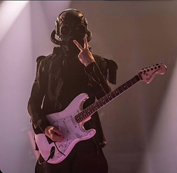 Why are men who play any type of guitar so attractive?