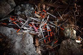 Used needles and condoms every where for kids to play with