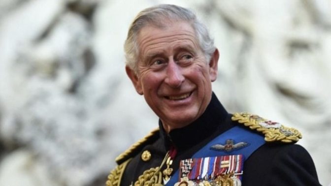 Is King Charles III an officer and what is his rank?