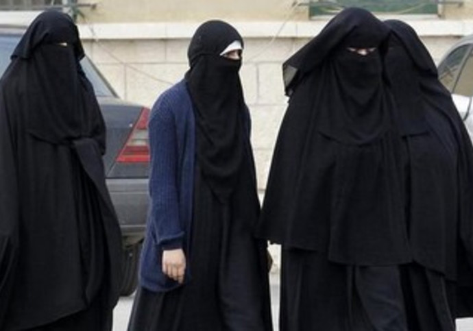 Is it misogynistic to tell women to dress conservatively?