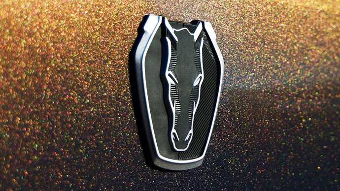 Dark Horse’s signature exterior color Blue Ember Metallic paint, a cool, dark shade that emits a warm glow in light.