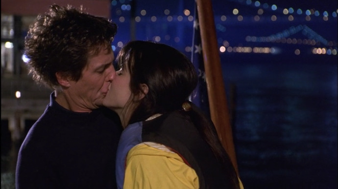 She kisses him, right before passing out from drinking too much