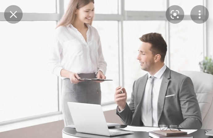 What are signs a guy is attracted to you at work?
