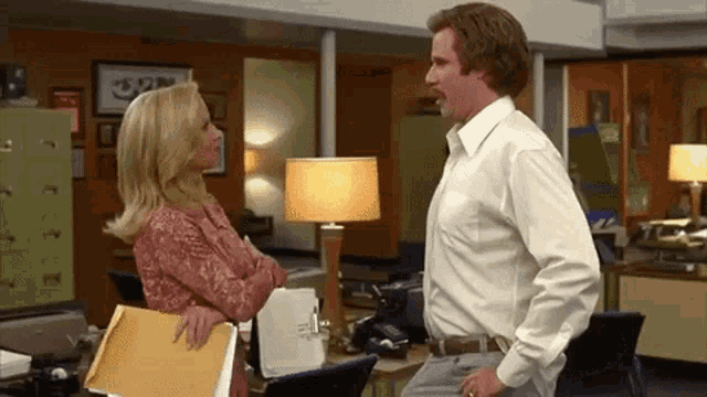 What are signs a guy is attracted to you at work?