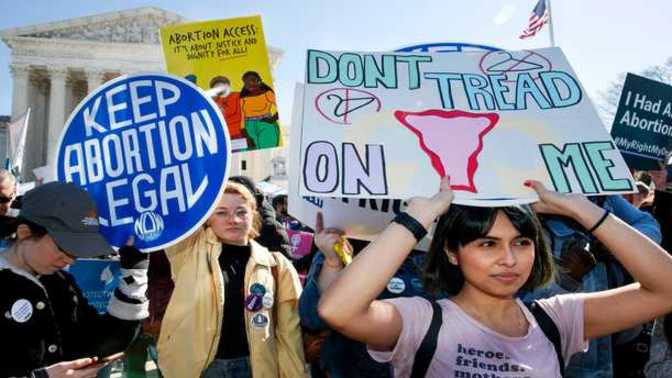 Why do women have less empathy for newborn children compared to men?