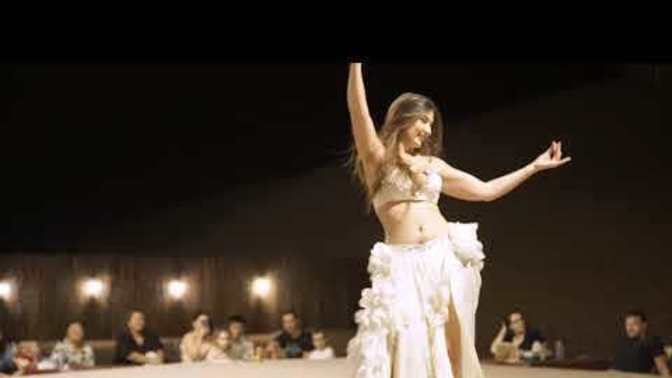 Girls, do you think that Belly Dancing or Tahitian Tapa dancing would give you a better hip and core workout?