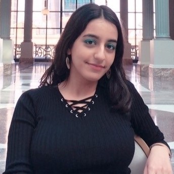 What about this picture makes it seem sexy even though she isnt showing much skin?