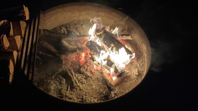 How recently have you sat around a campfire at night?