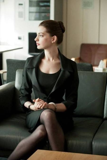 Why do women sit with their legs crossed?