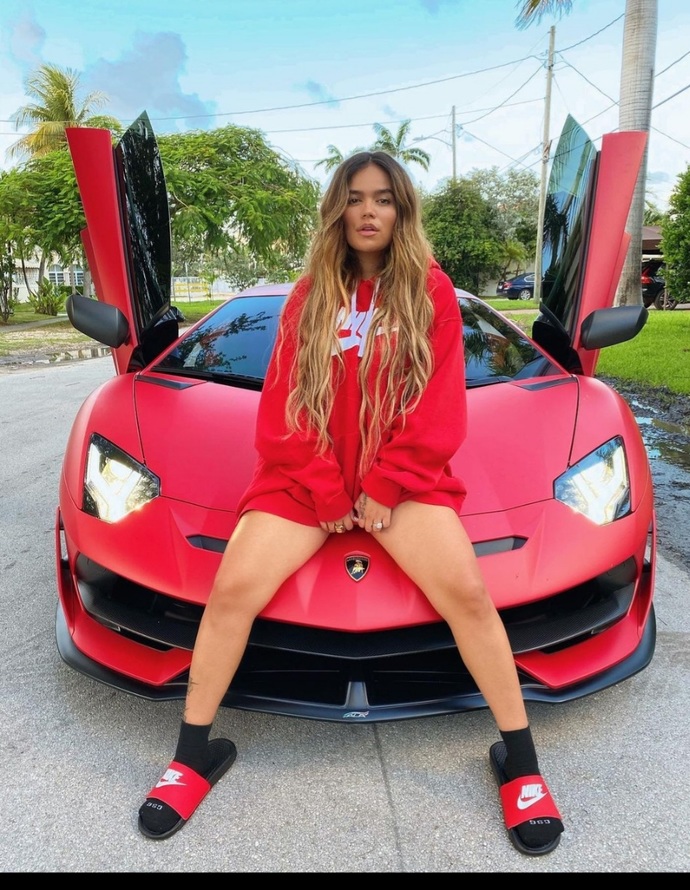 Whats your opinion of Karol G as an artist if you listen to her music and her physical looks?