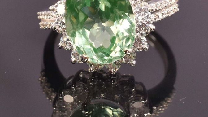 The economies in the world are so bad , guess what I paid for this Sterling silver Green Sapphire ring and this 5.30 Natural Ruby gem stone ?