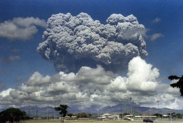 12 June 1991 shows a giant mushroom cloud of steam and ash exploding out of Mount Pinatubo volcano during its eruption.