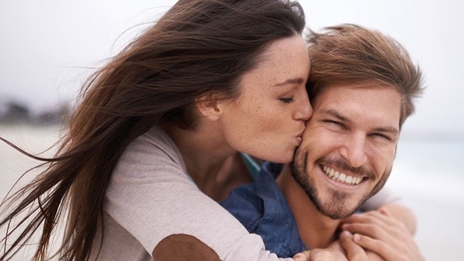 Is it okay for friends to kiss on the cheeks if they are in a relationship?