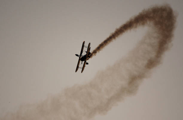 Ashley Key wing walks on the biplane of Greg Shelton.