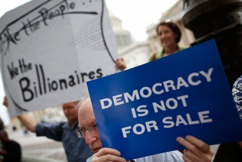 Should there be a law where corporations are prohibited from donating money to politicians and political campaigns here in the U. S. A?