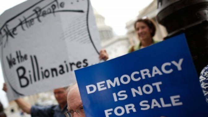 Should there be a law where corporations are prohibited from donating money to politicians and political campaigns here in the U. S. A?