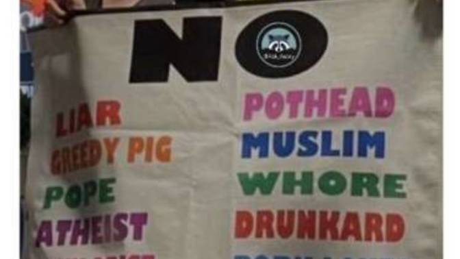 Are you or have you done any or all of the following things on this protesters sign?