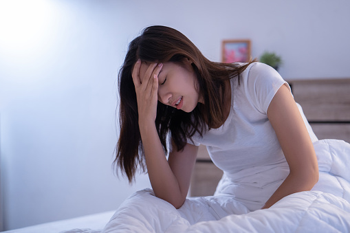 Why do some people get headaches if they have naps during the day?
