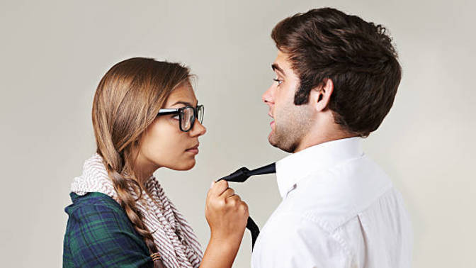 Why would a handsome guy who is an absolute hunk date dominating women?