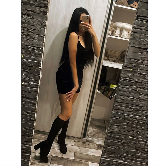 Which black dress looks better?