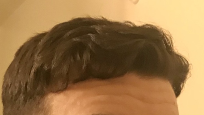 Is curly hair unprofessional in an office setting?