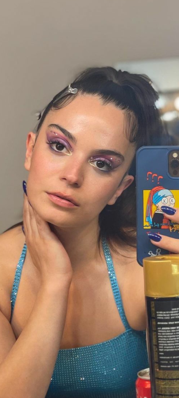 Does she have a masculine face and why?