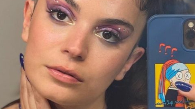Does she have a masculine face and why?