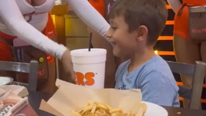 Is it appropriate for a father to take his underaged son to hooters where girls will be touching him for his birthday?