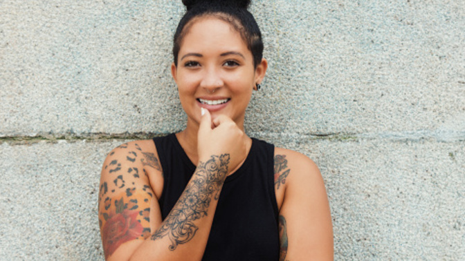 Why do some guys dislike girls with tattoos and piercings?