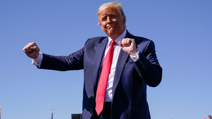 Does Donald Trump look like hes jerking off 2 guys at once when he dances?