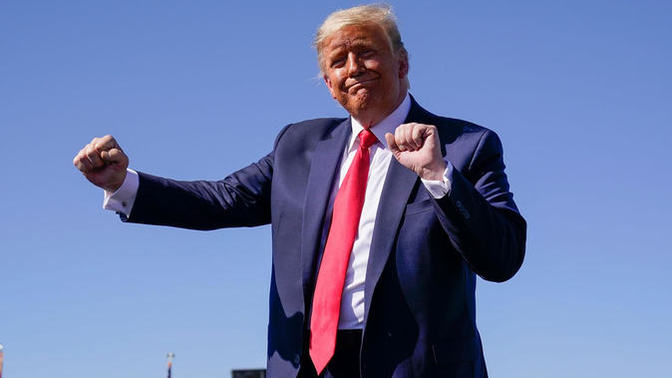 Does Donald Trump look like he's jerking off 2 guys at once when he dances?