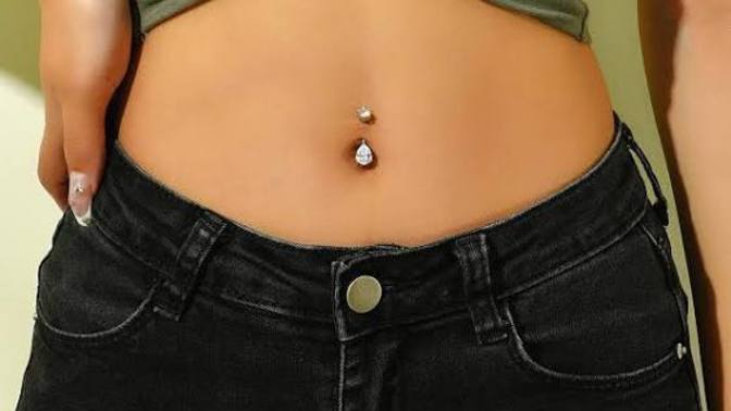 Guys, Does a pierced belly make her cuter?