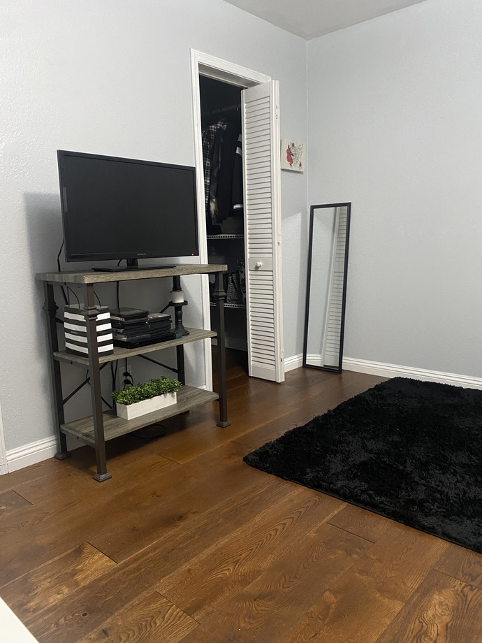 POLL- SHOULD I KEEP THE BLACK TABLE FOR MY LIVING ROOM OR BROWN TABLE?