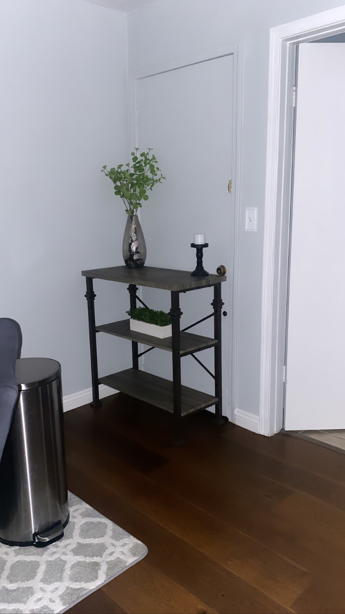 POLL- SHOULD I KEEP THE BLACK TABLE FOR MY LIVING ROOM OR BROWN TABLE?