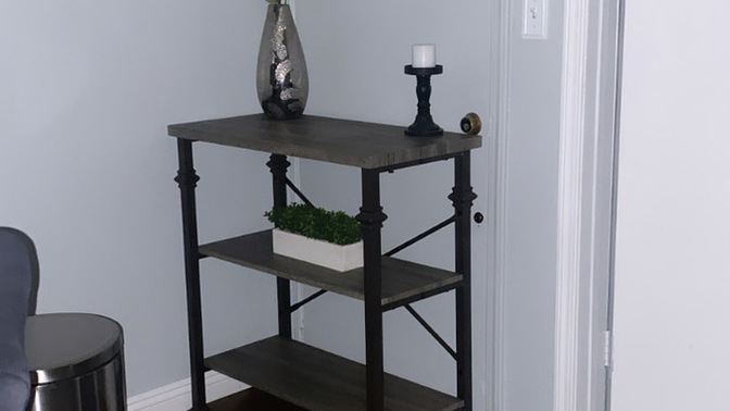 POLL- SHOULD I KEEP THE BLACK TABLE FOR MY LIVING ROOM OR BROWN TABLE?